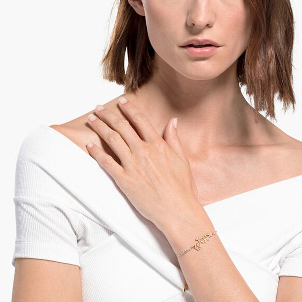 Pulsera Swarovski Symbolic Love, baño en tono dorado